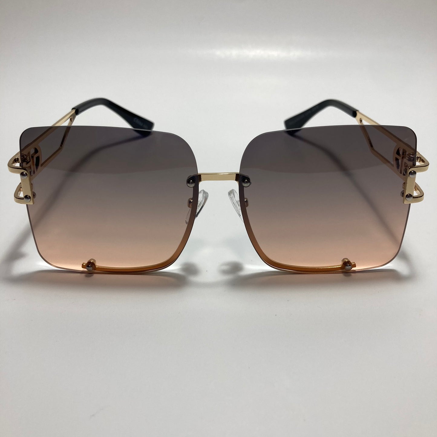 womens oversize square black and pink rimless sunglasses