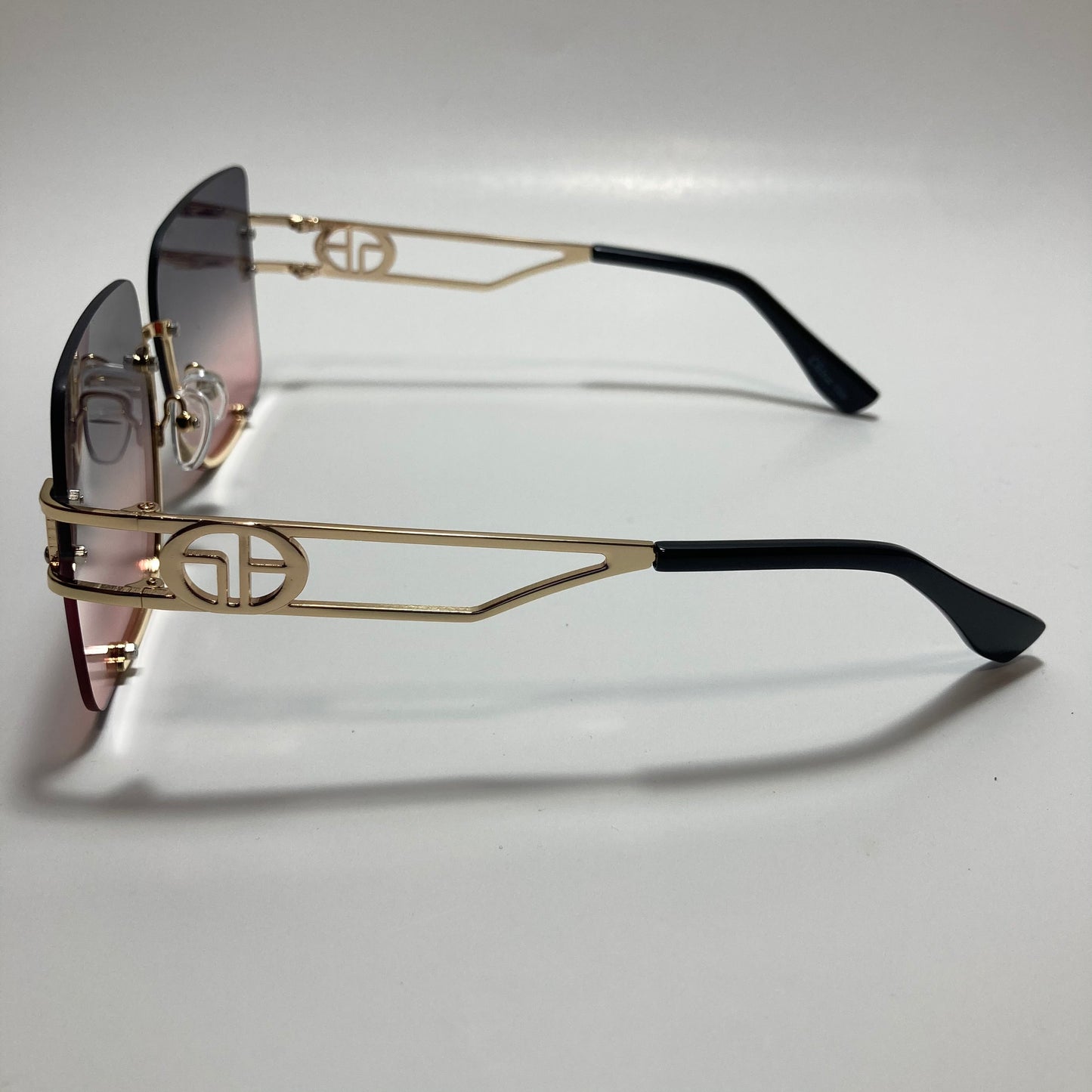 womens oversize square black and pink rimless sunglasses
