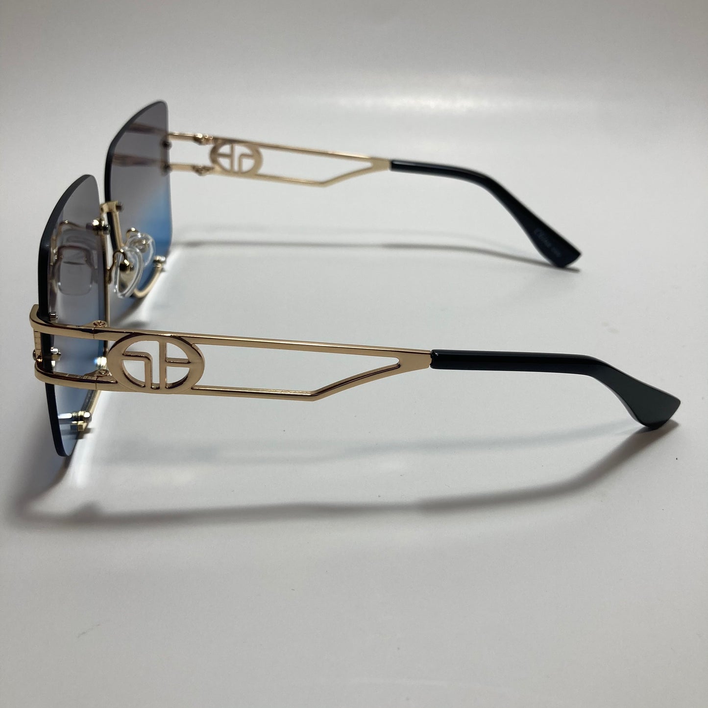 womens oversize square black and blue rimless sunglasses