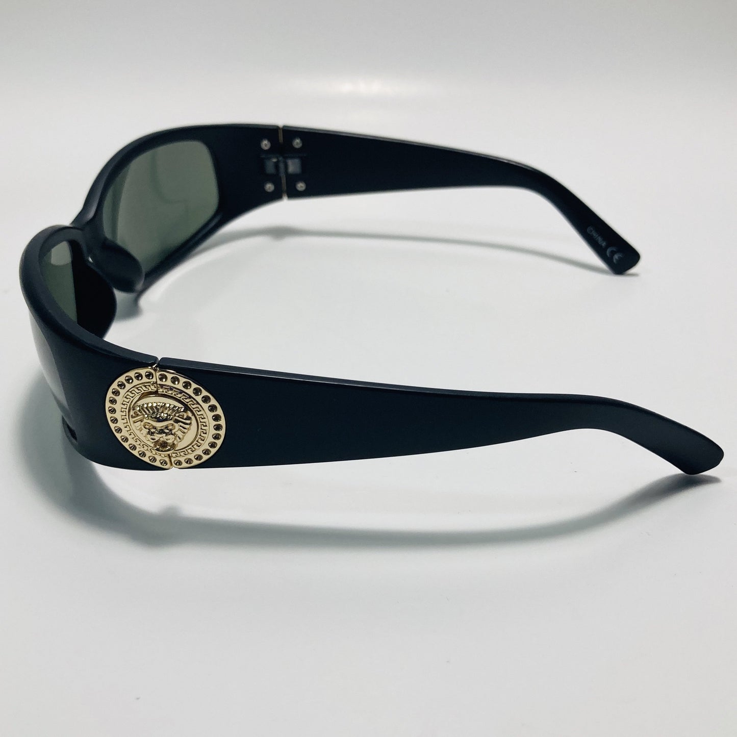 black and green womens and mens wrap around sunglasses