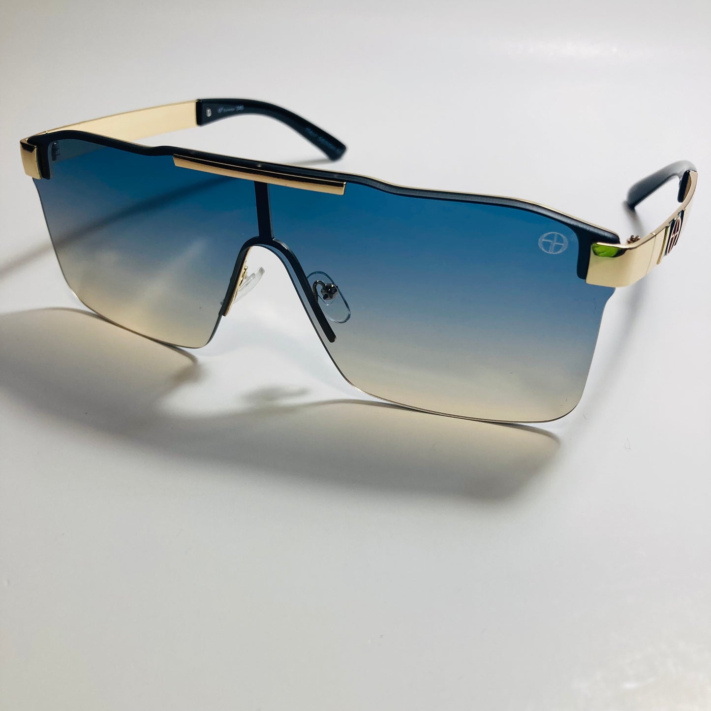 mens and womens blue yellow and gold shield sunglasses