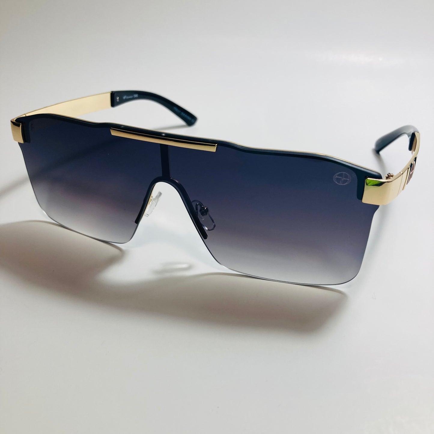 mens and womens black and gold shield sunglasses