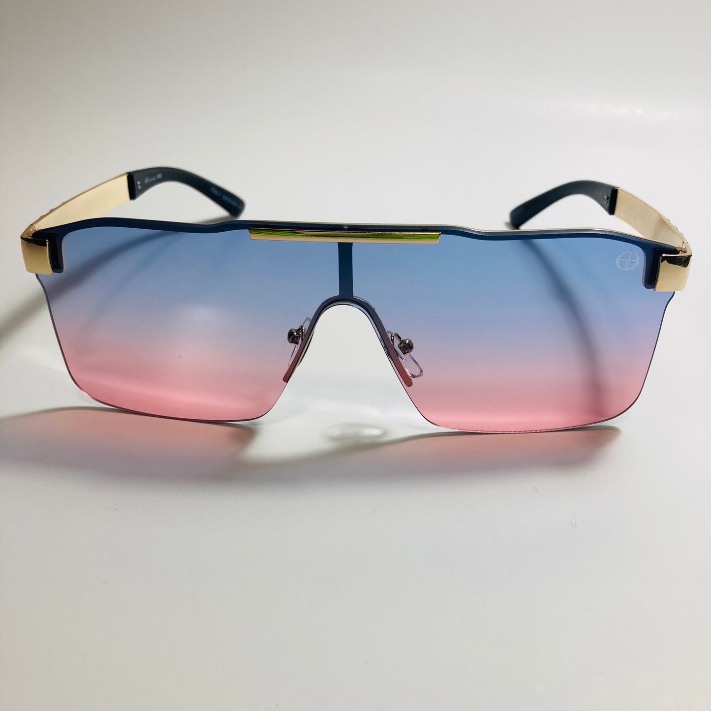 mens and womens pink blue and gold shield sunglasses