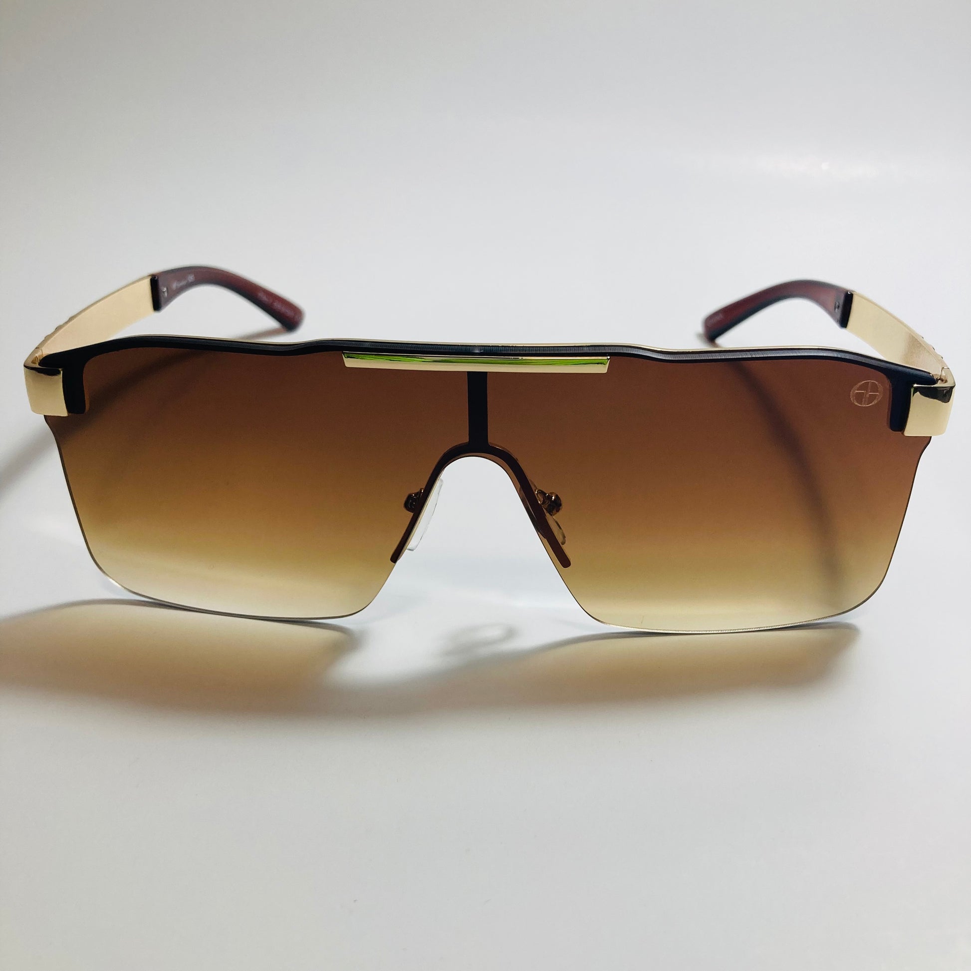 mens and womens brown and gold shield sunglasses
