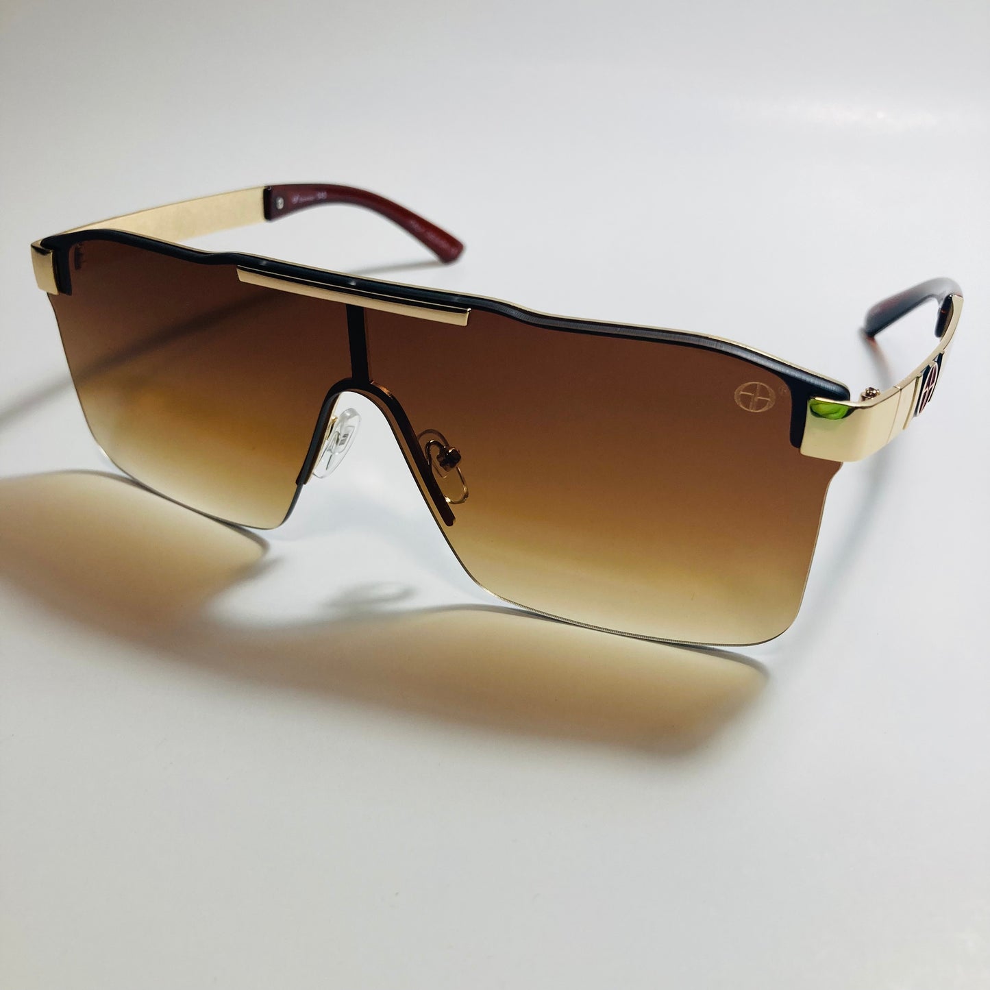 mens and womens brown and gold shield sunglasses