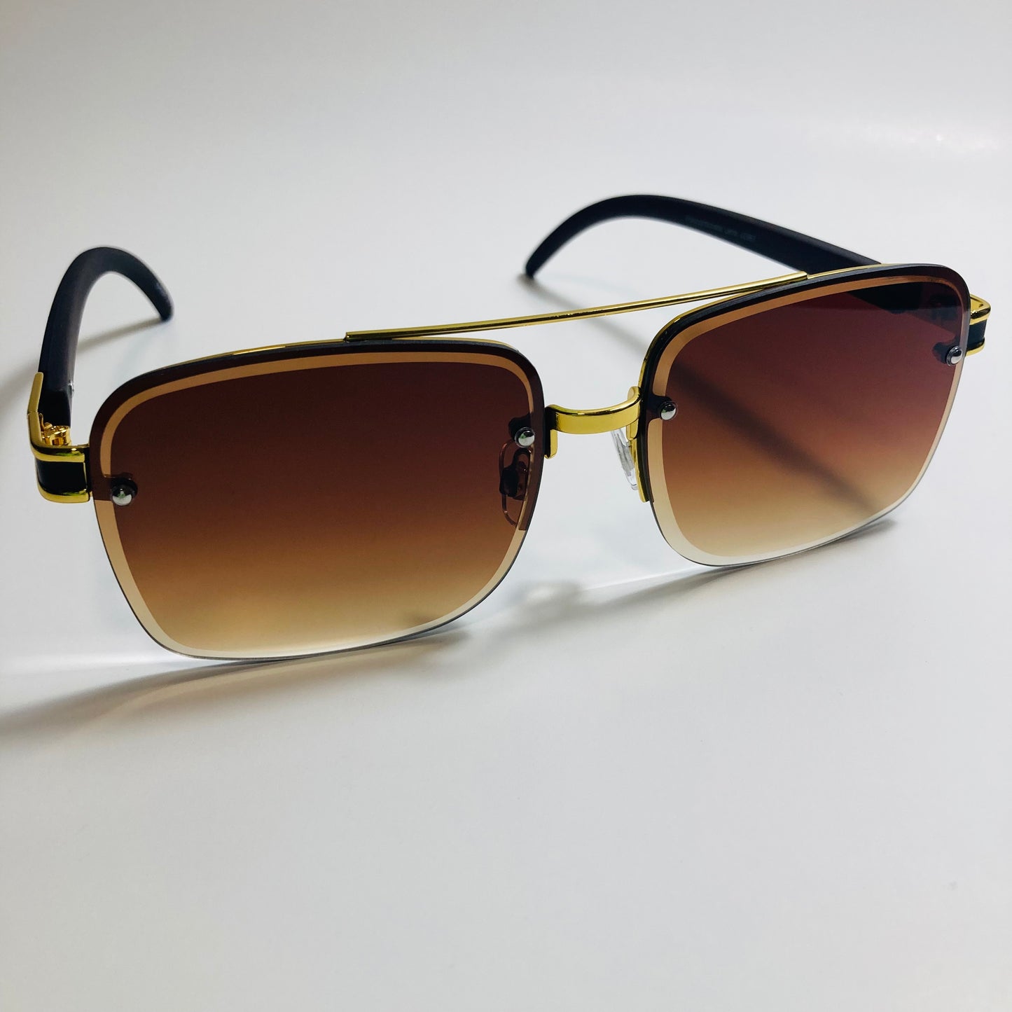 mens and womens brown and gold aviator sunglasses