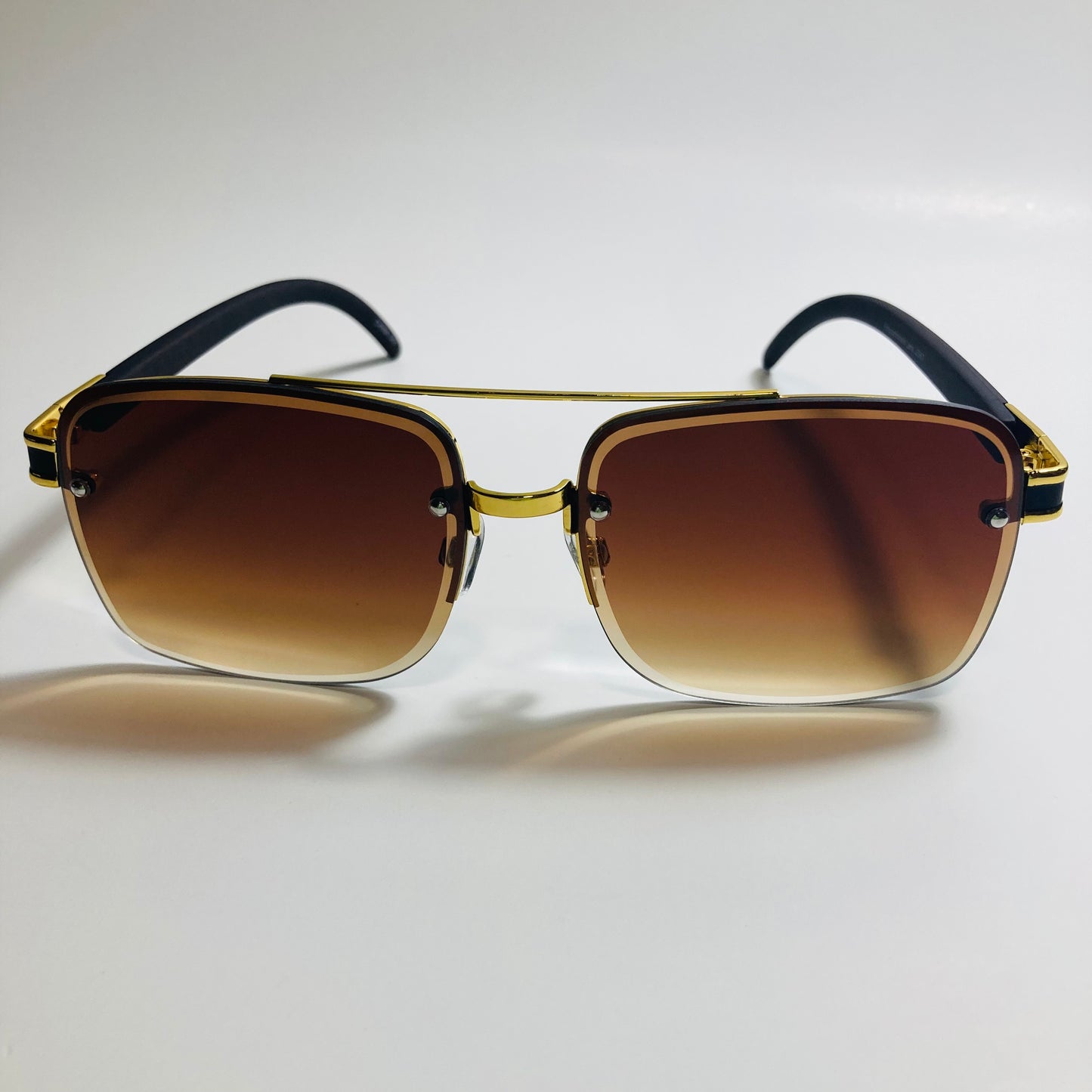mens and womens brown and gold aviator sunglasses