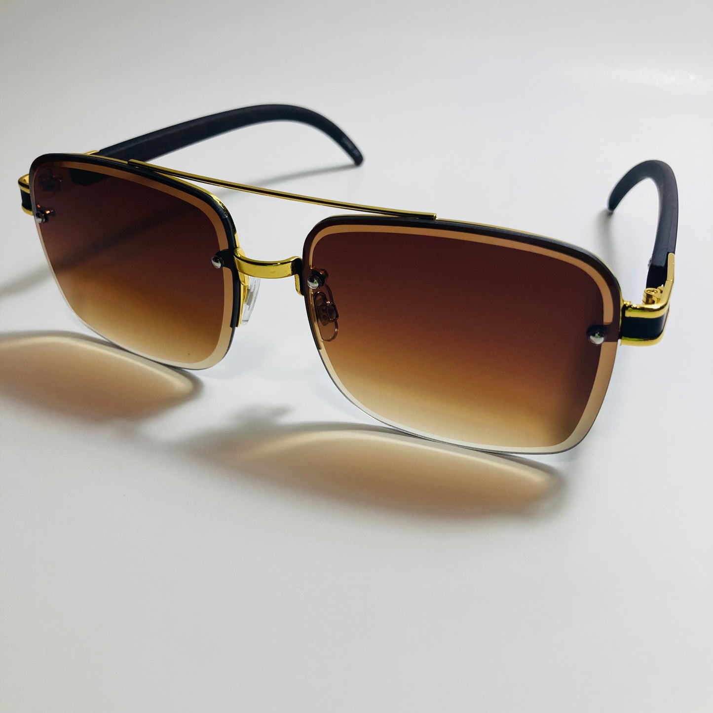 mens and womens brown and gold aviator sunglasses