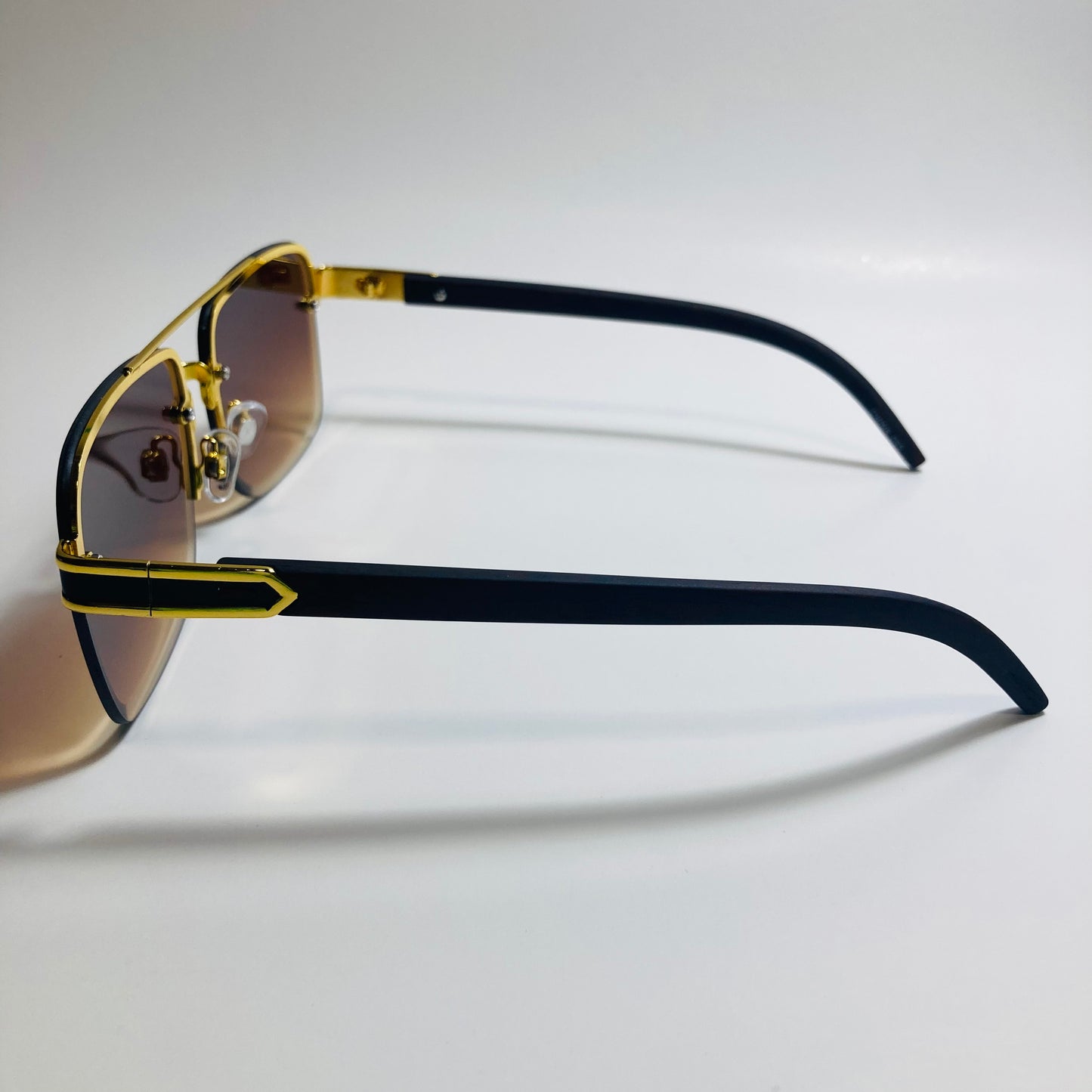mens and womens brown and gold aviator sunglasses