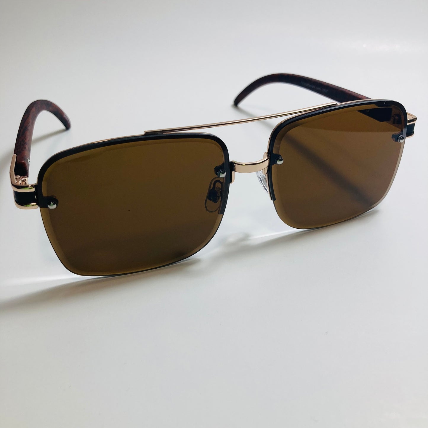 mens and womens brown and gold aviator sunglasses