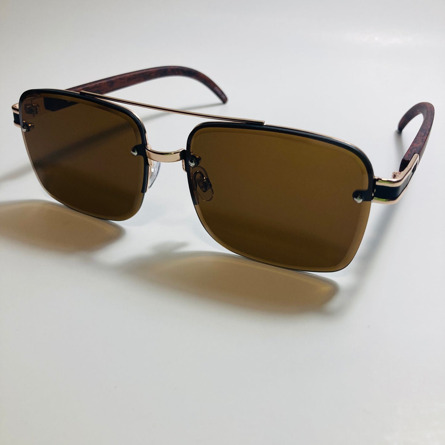 mens and womens brown and gold aviator sunglasses