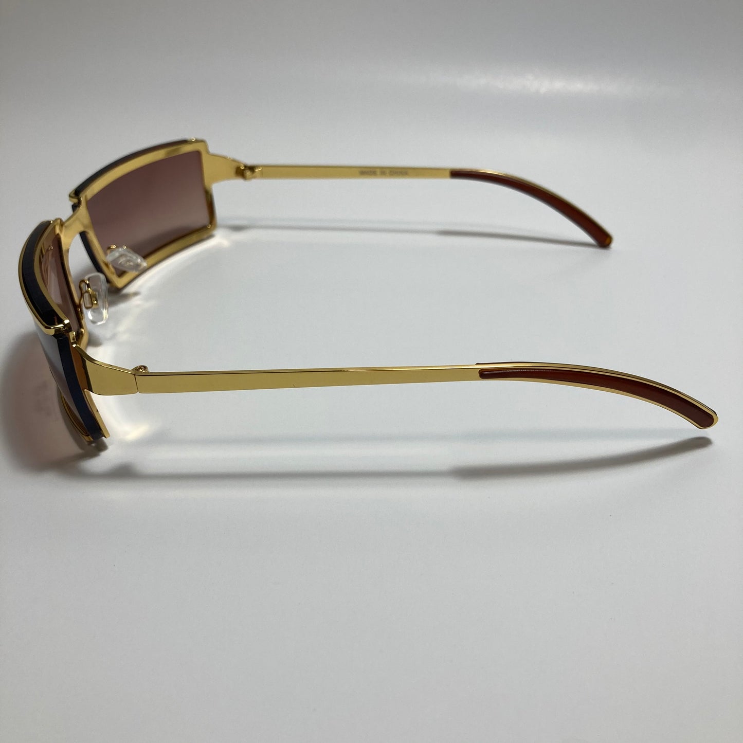 mens and womens gold wrap sunglasses with brown lenses