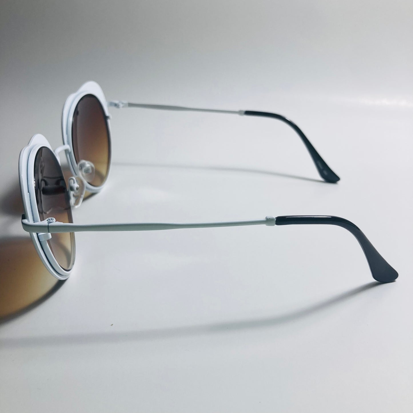 womens brown and white heart shape sunglasses