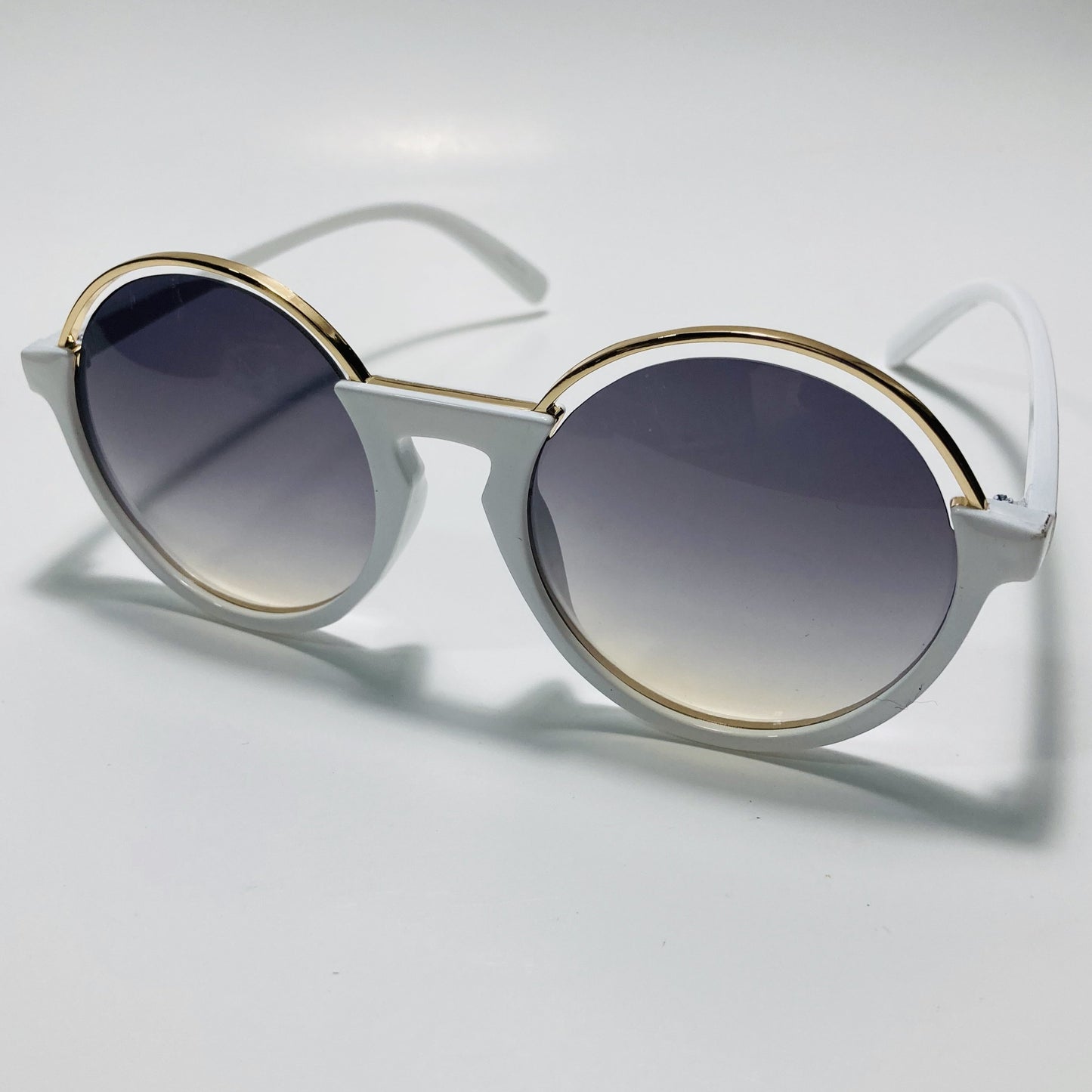 womens white and gray round sunglasses