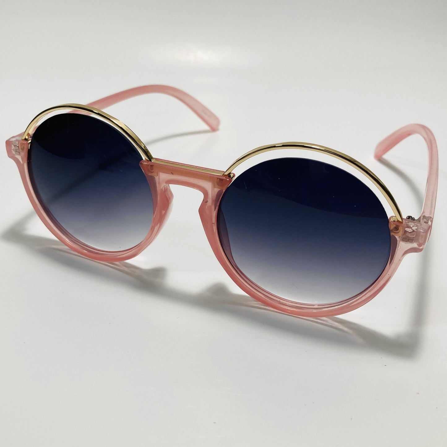 womens pink and black round sunglasses