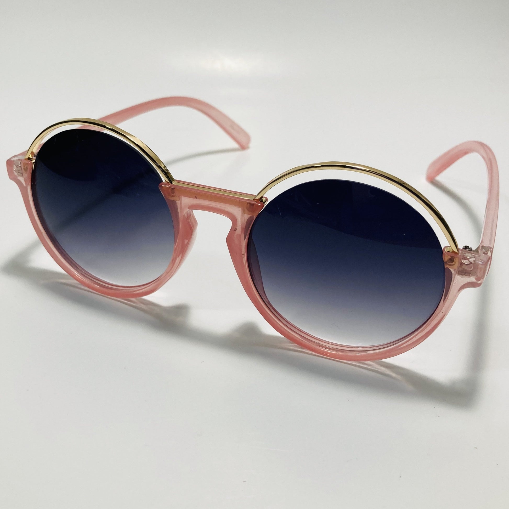 womens pink and black round sunglasses