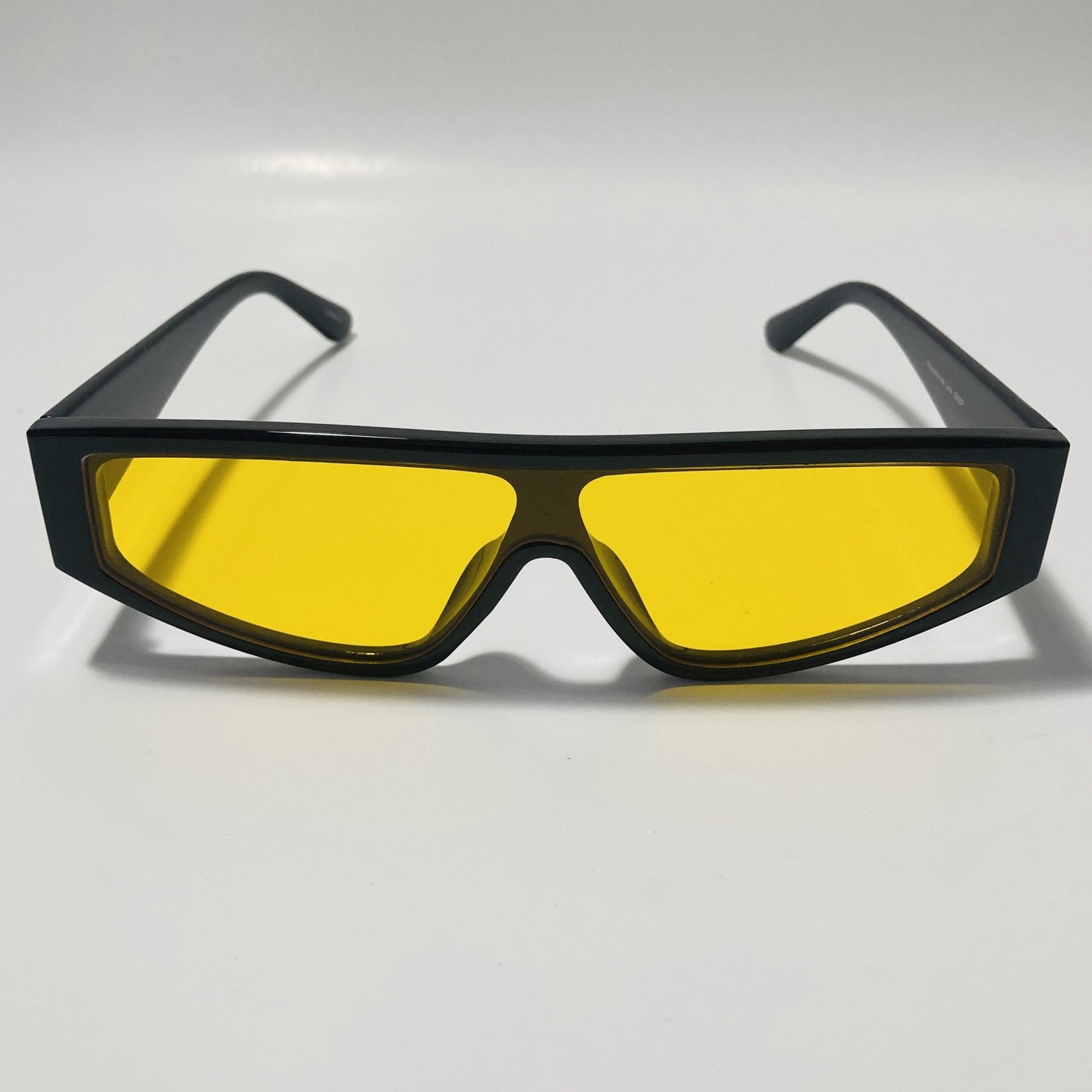 mens and womens black futuristic sunglasses with yellow lenses