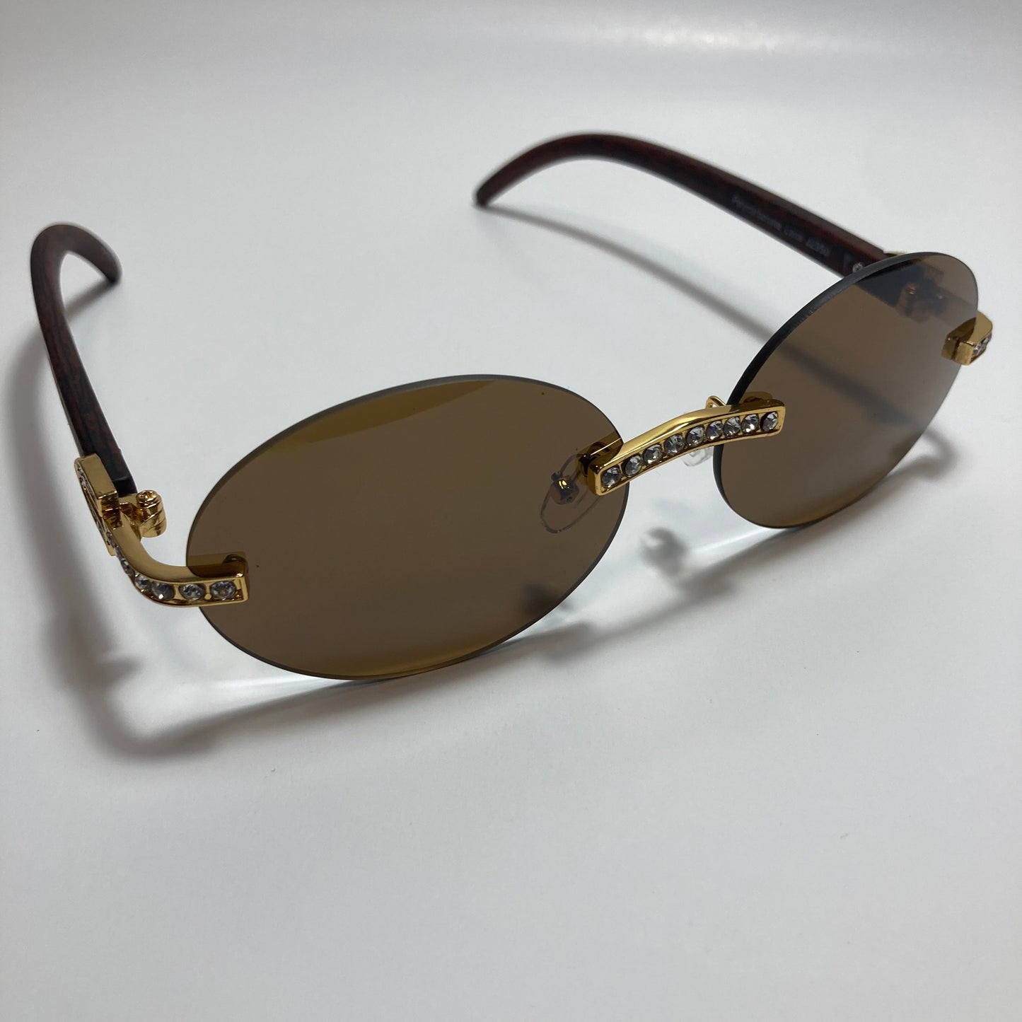 mens and womens rimless round gold diamond sunglasses with brown lenses