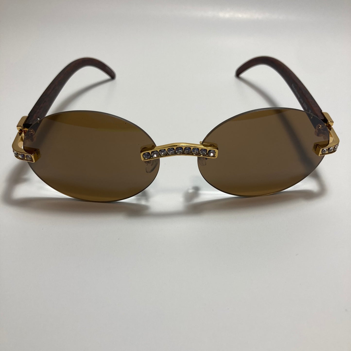 mens and womens rimless round gold diamond sunglasses with brown lenses