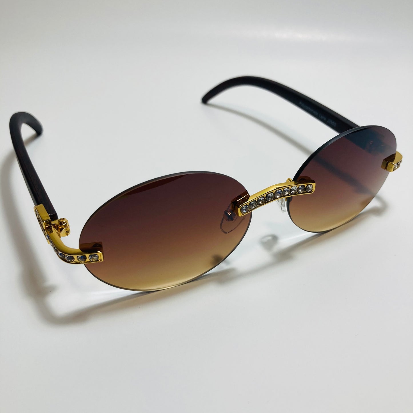 mens and womens rimless round gold diamond sunglasses with brown lenses