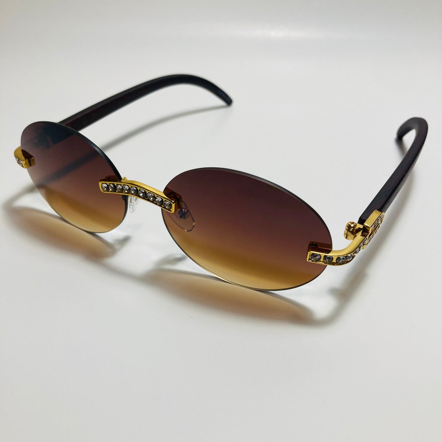 mens and womens rimless round gold diamond sunglasses with brown lenses