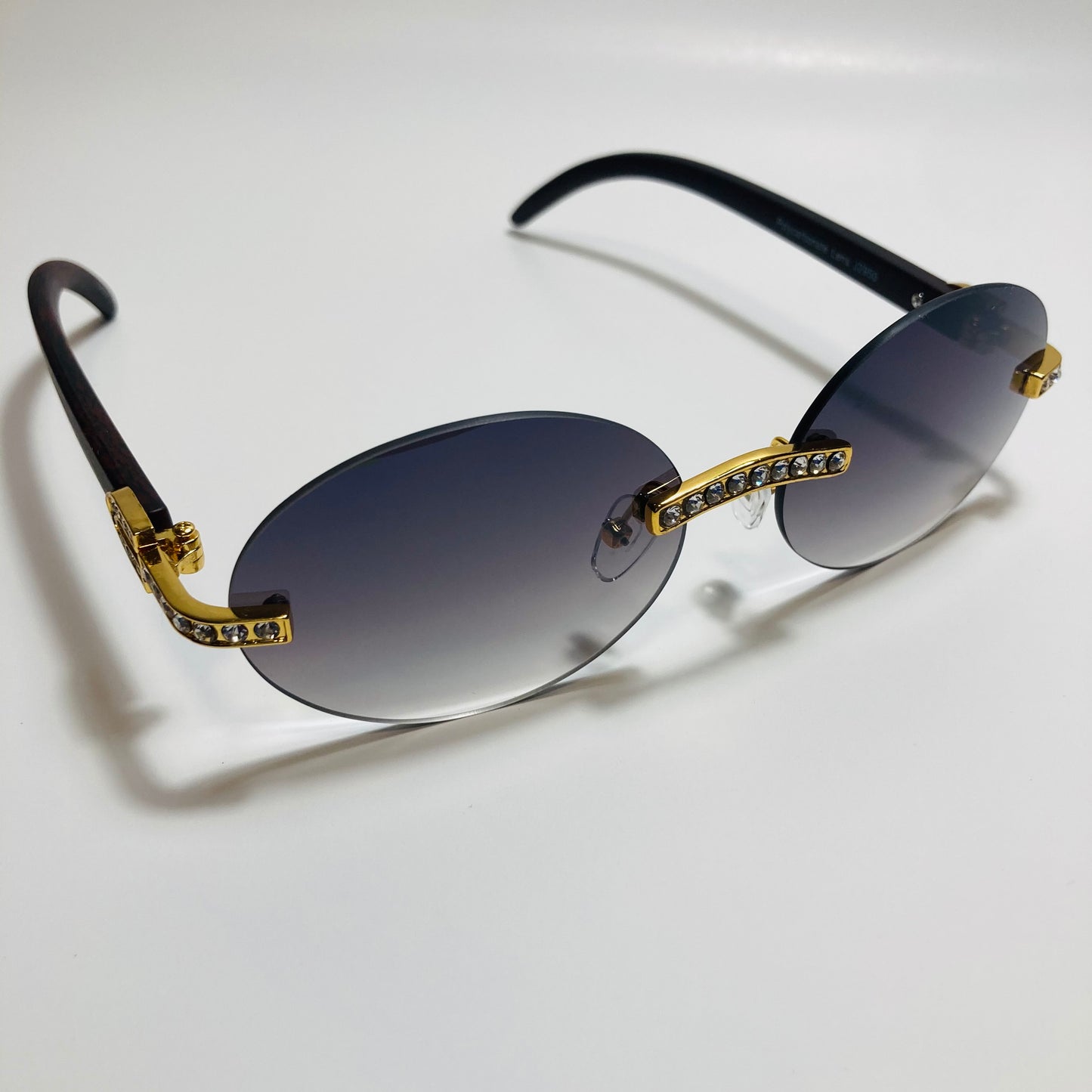 mens and womens rimless round gold diamond sunglasses with black lenses