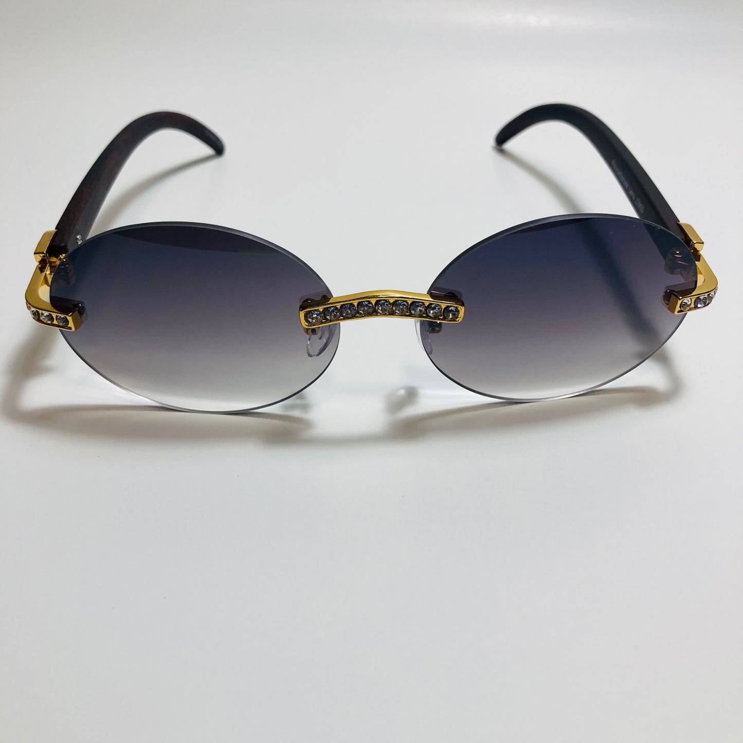 mens and womens rimless round gold diamond sunglasses with black lenses