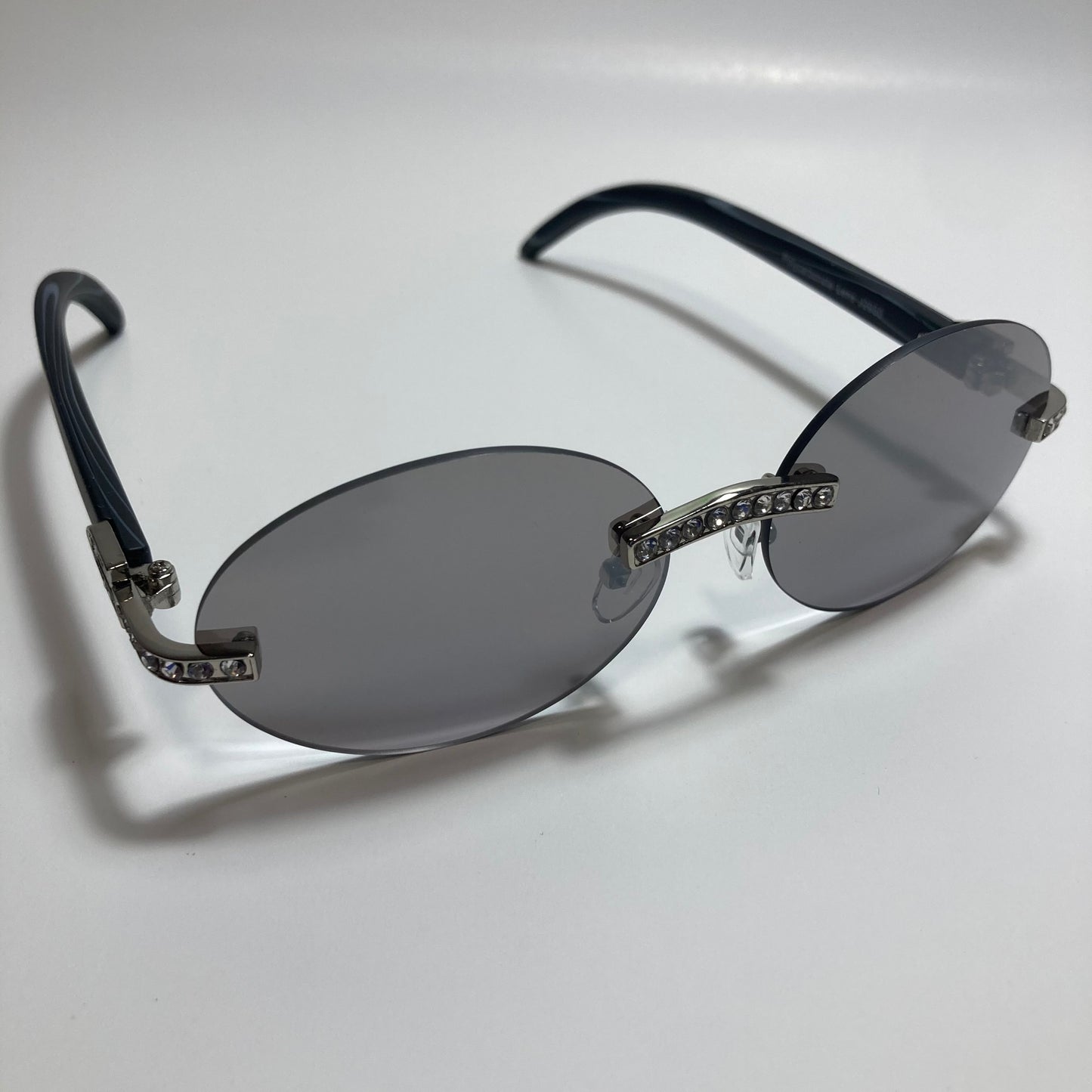 mens and womens rimless round silver diamond sunglasses with gray lenses