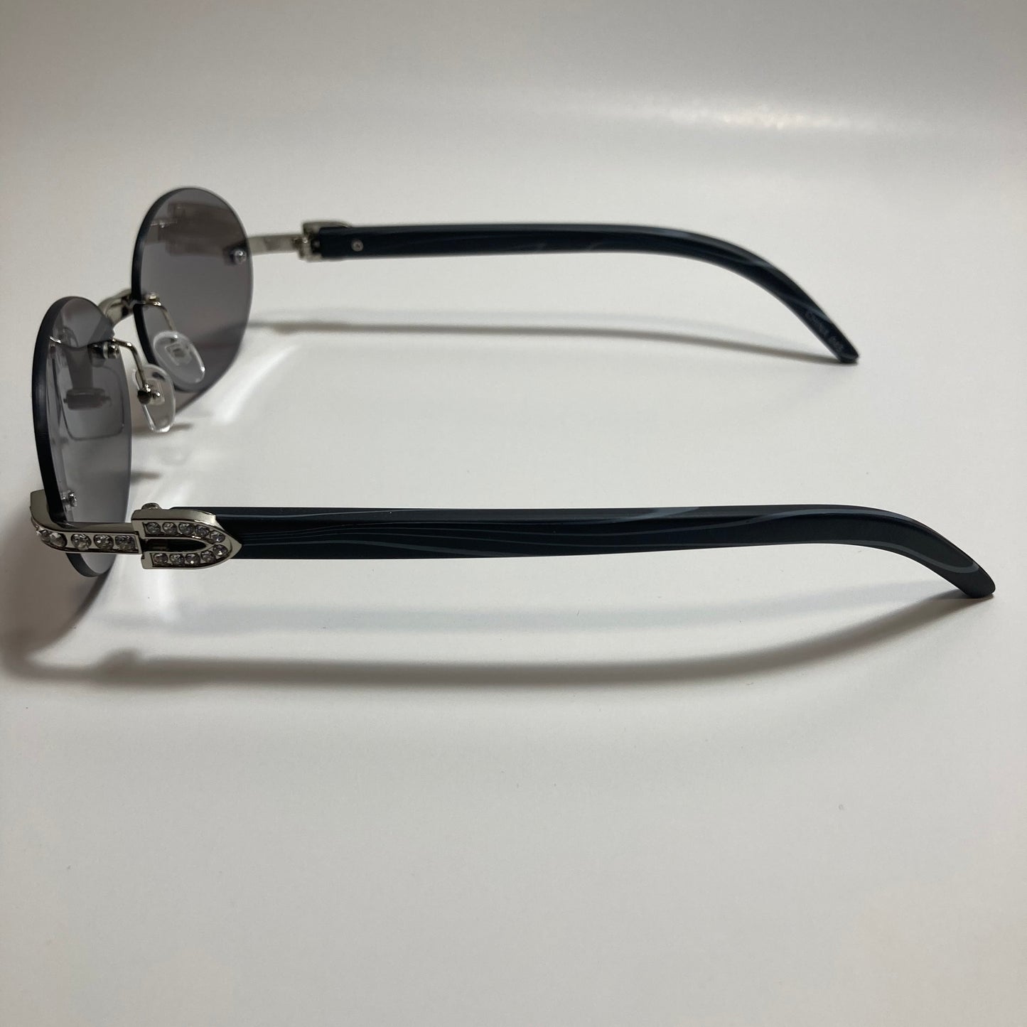 mens and womens rimless round silver diamond sunglasses with gray lenses