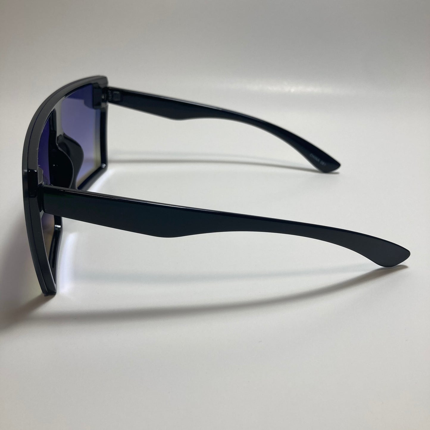 womens black and blue mirrored shield sunglasses