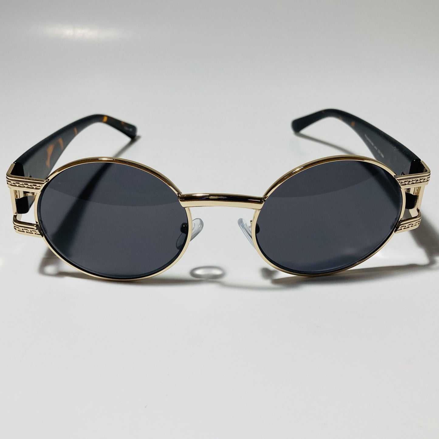 mens and womens black and gold round sunglasses