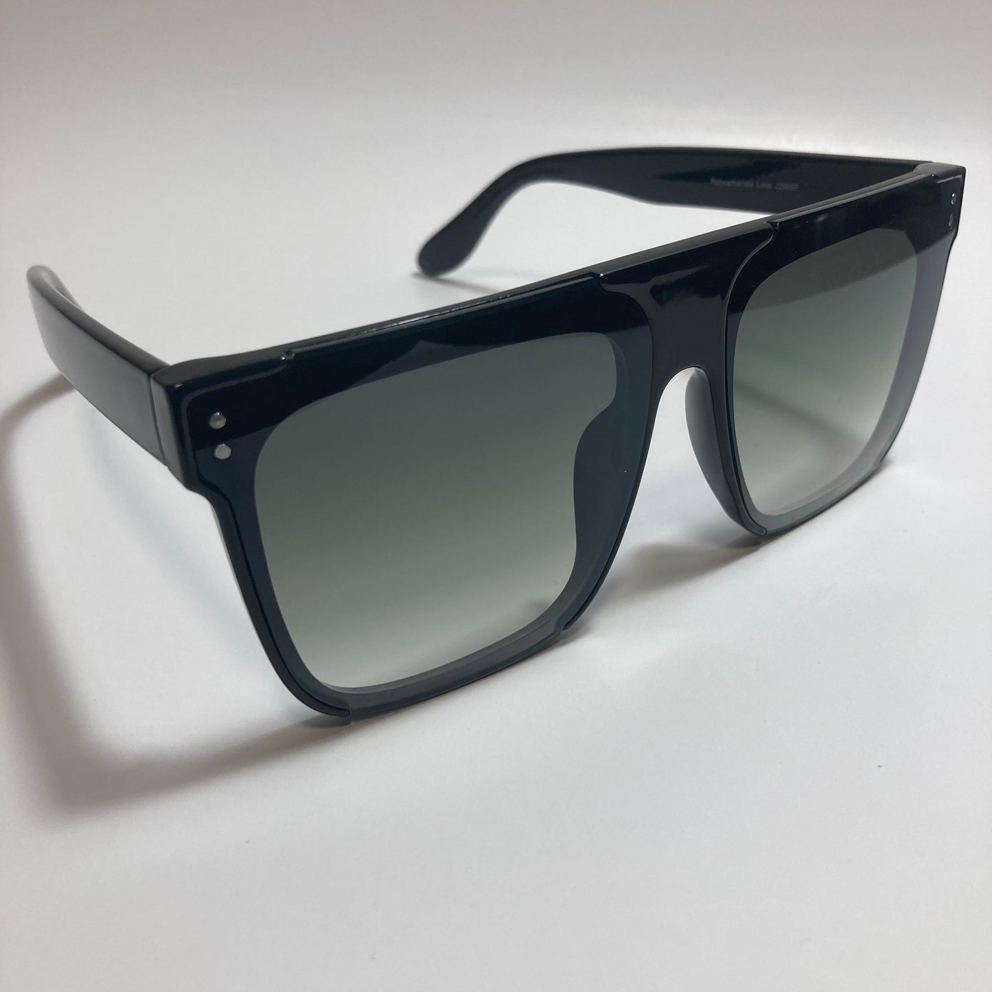 womens black oversize square sunglasses with green lenses
