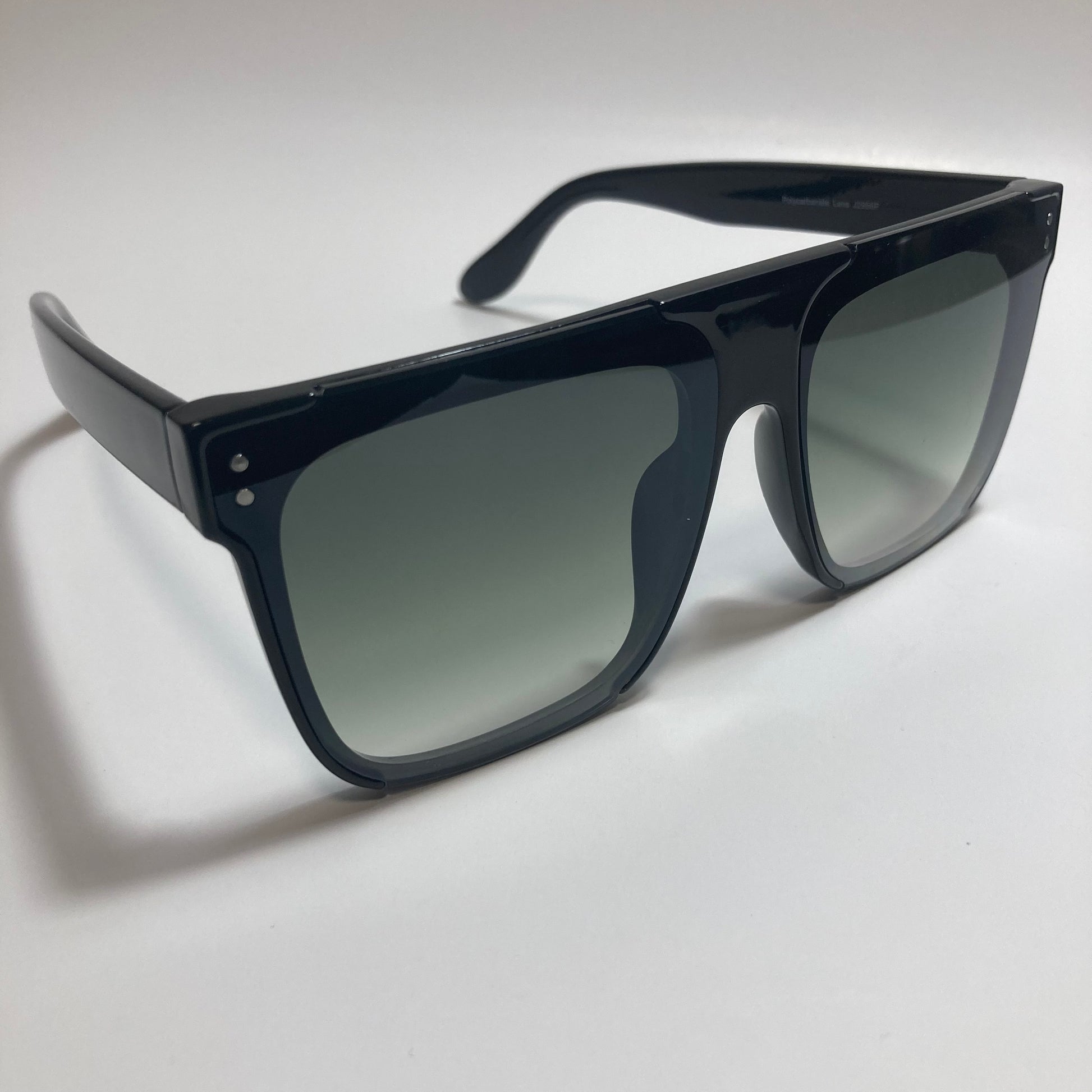 womens black oversize square sunglasses with green lenses