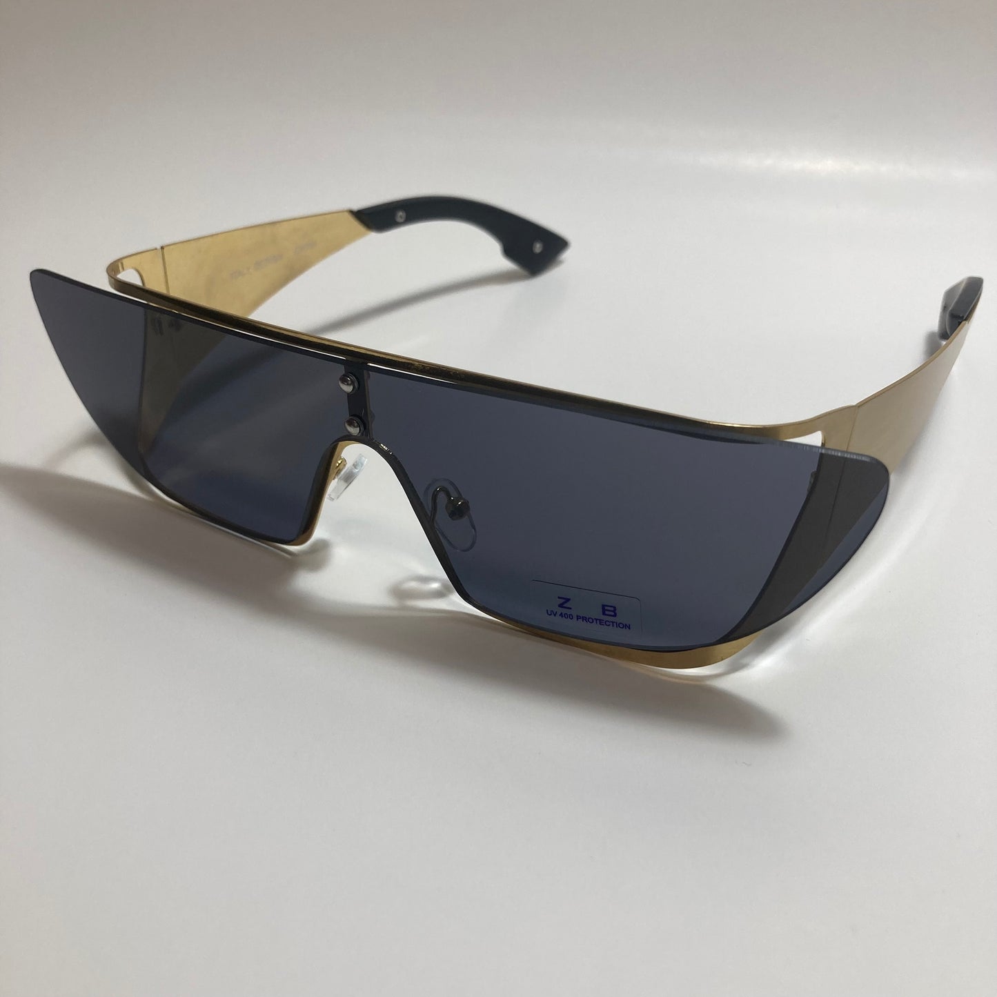 black and gold futuristic sunglasses