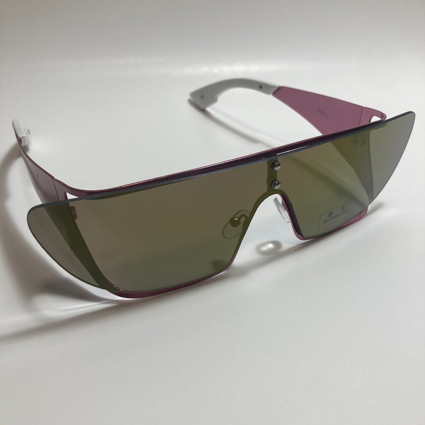 green and purple futuristic sunglasses