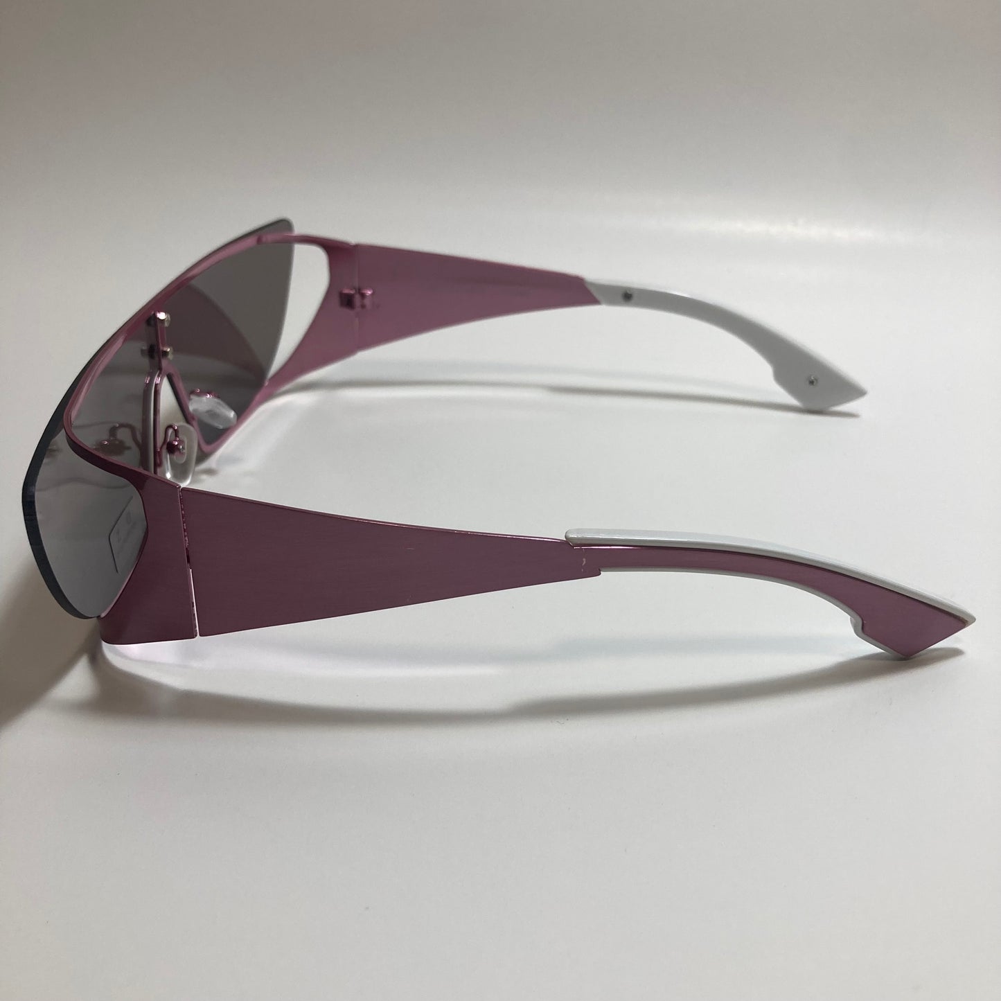 green and purple futuristic sunglasses