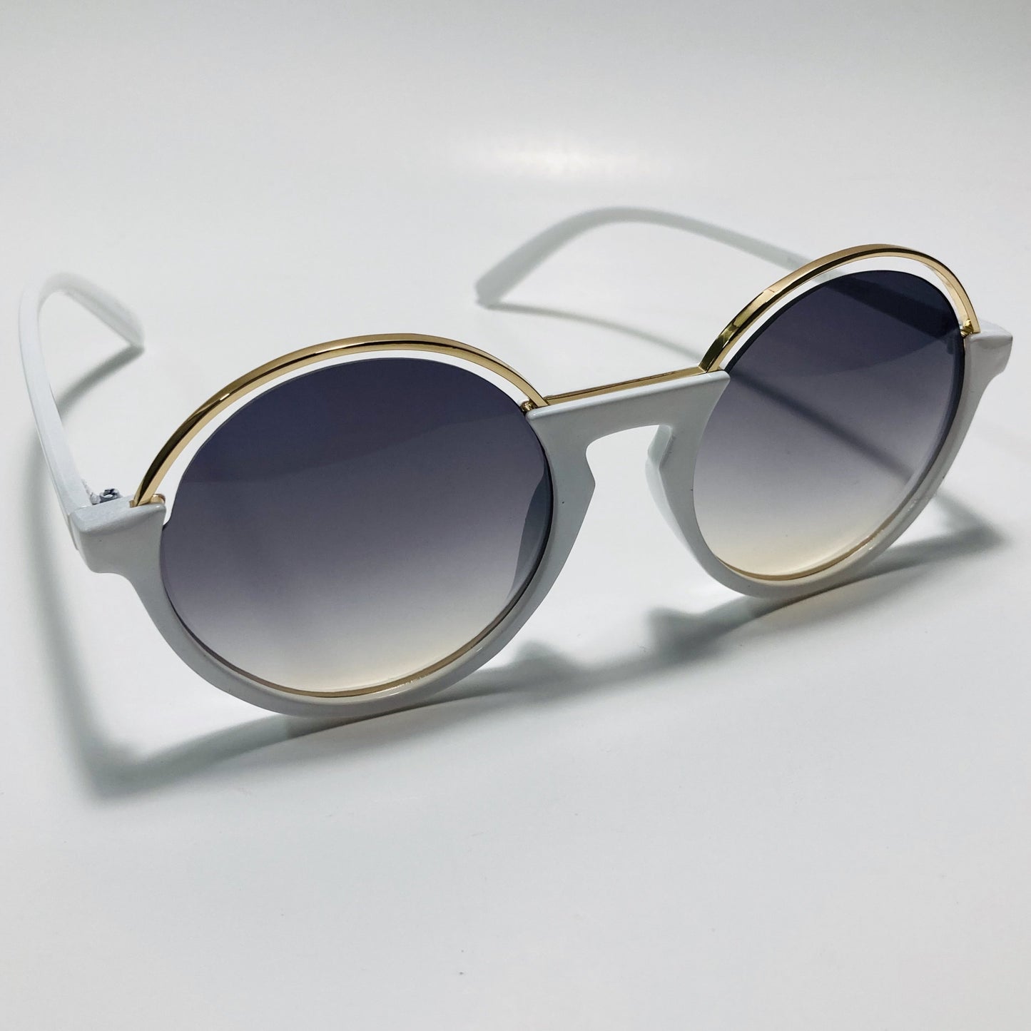 womens white and gray round sunglasses