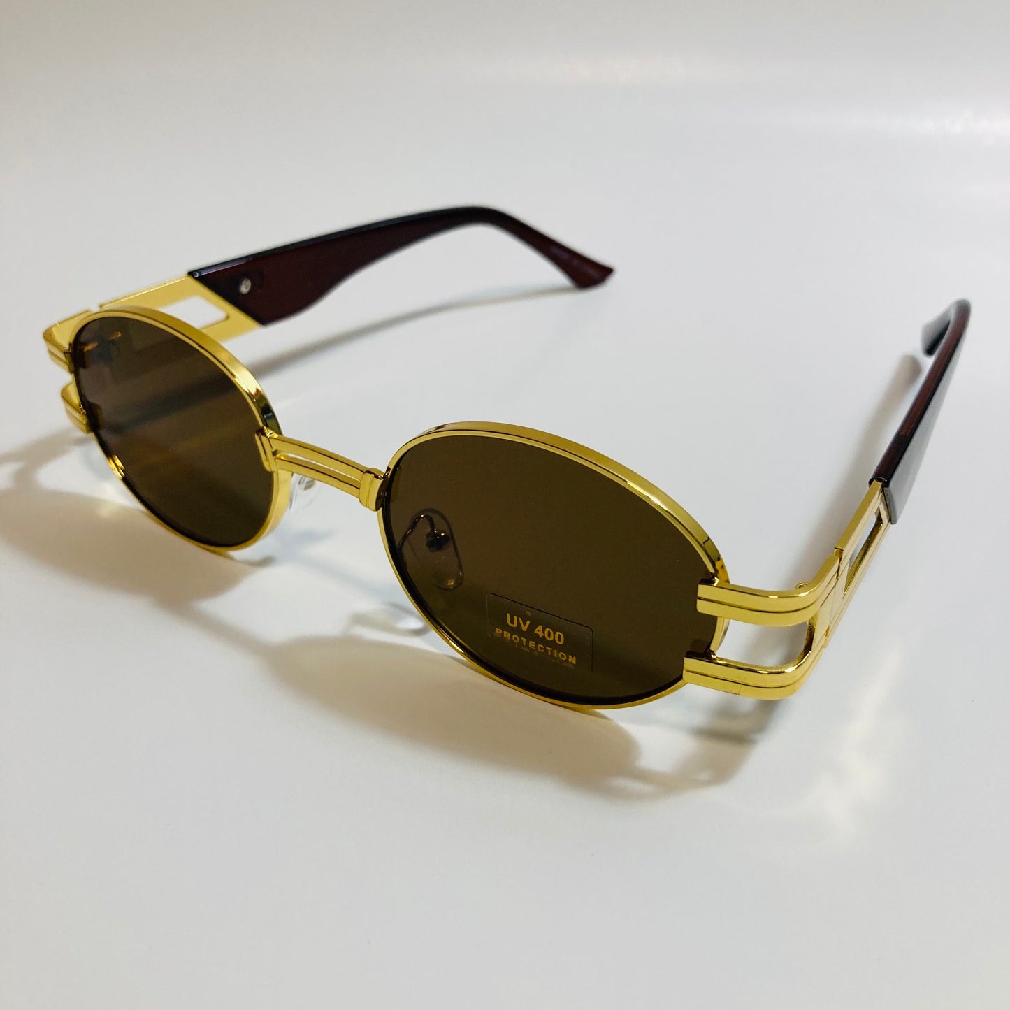 mens and womens gold and brown round sunglasses