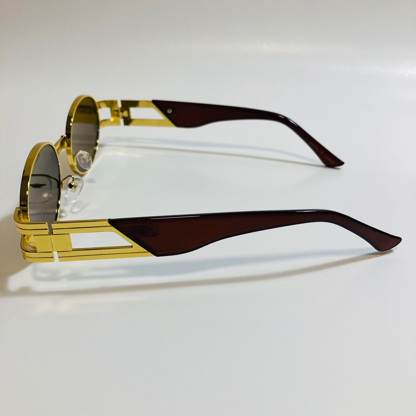 mens and womens gold and brown round sunglasses