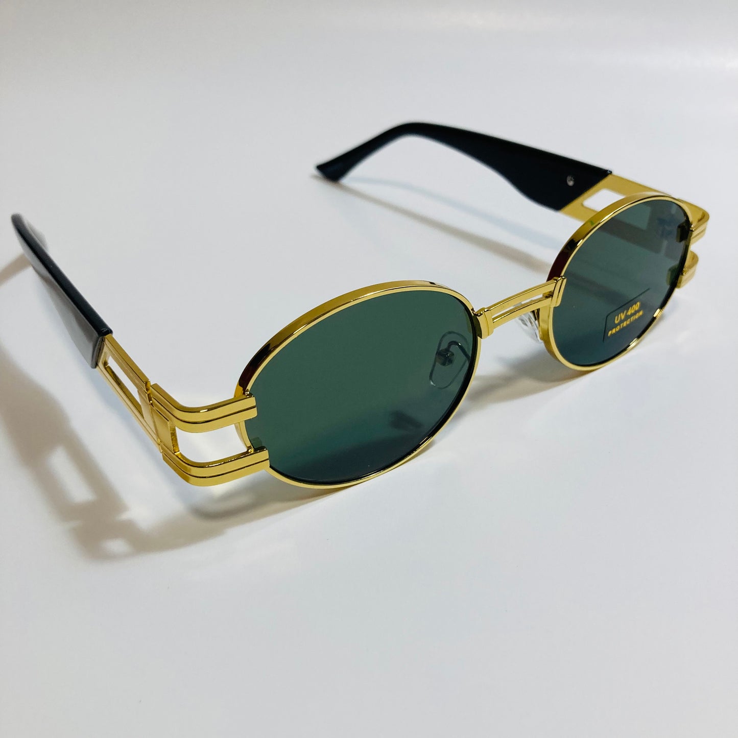 mens and womens green and gold round sunglasses