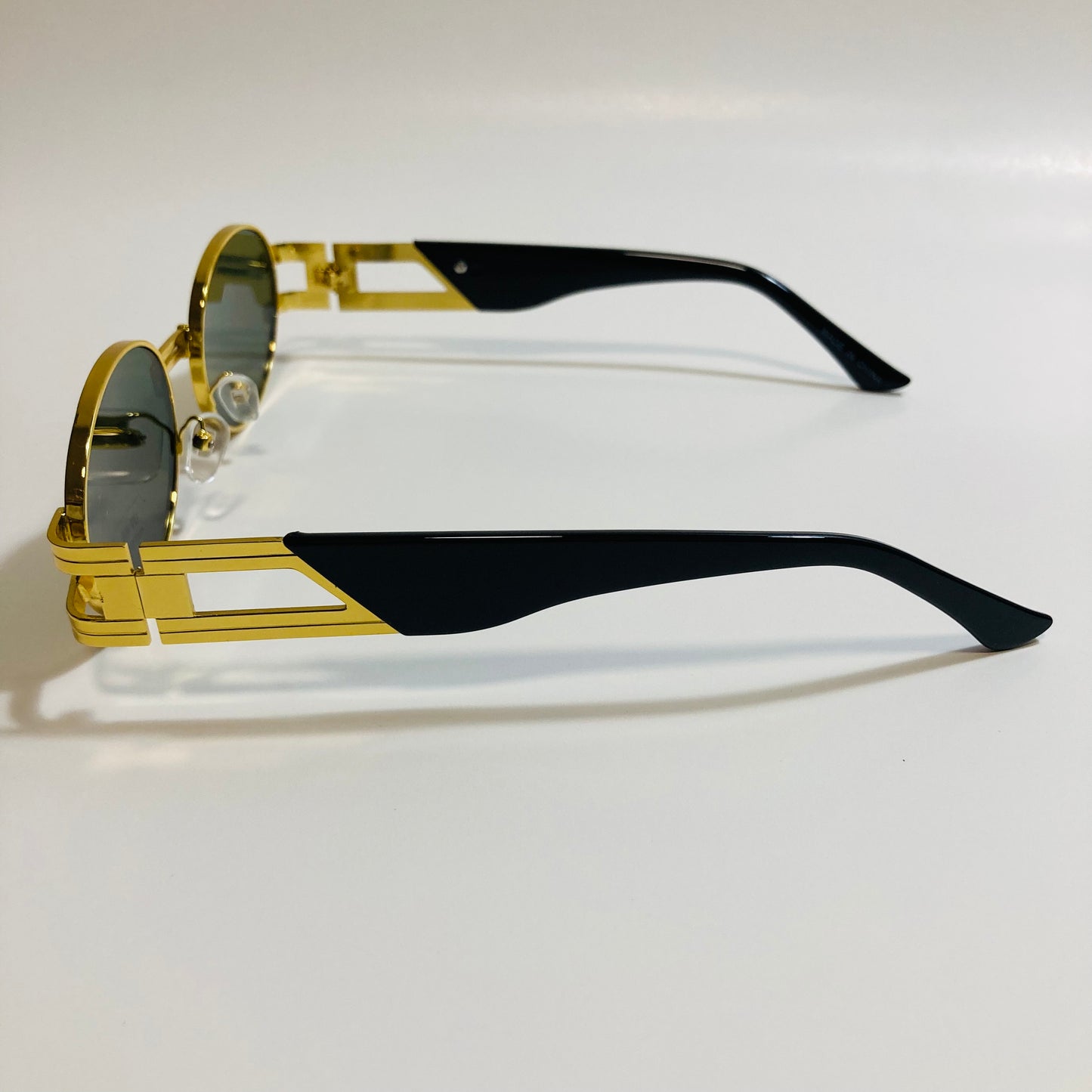 mens and womens green and gold round sunglasses