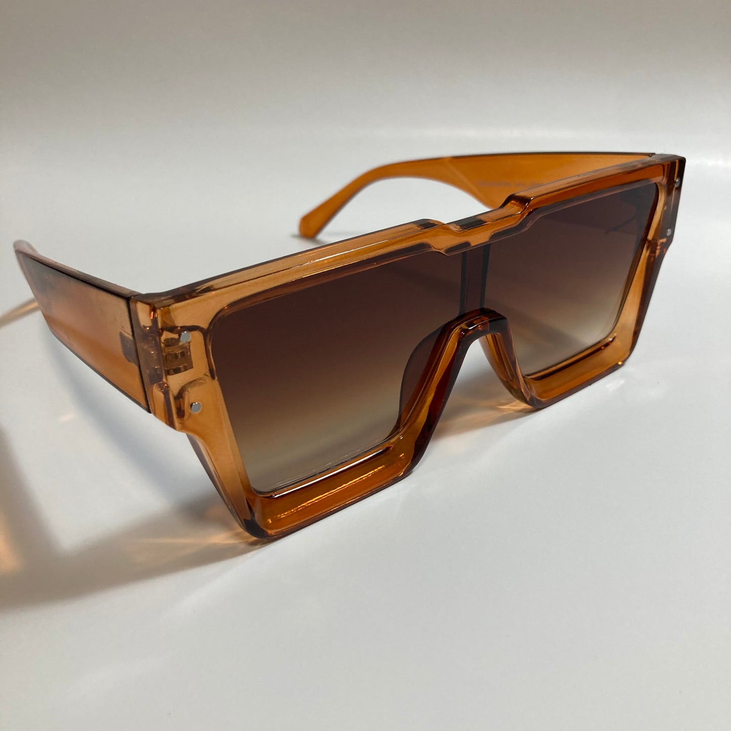 mens and womens brown oversize square sunglasses