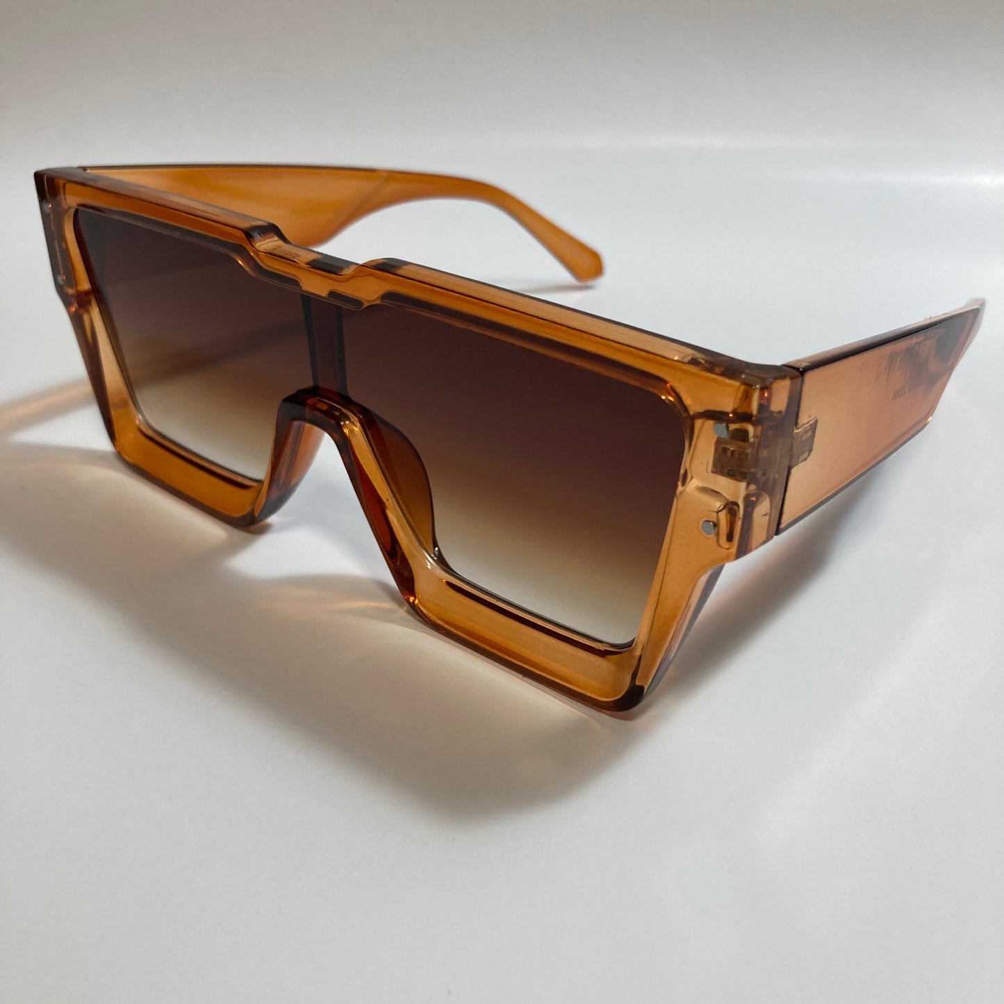 mens and womens brown oversize square sunglasses