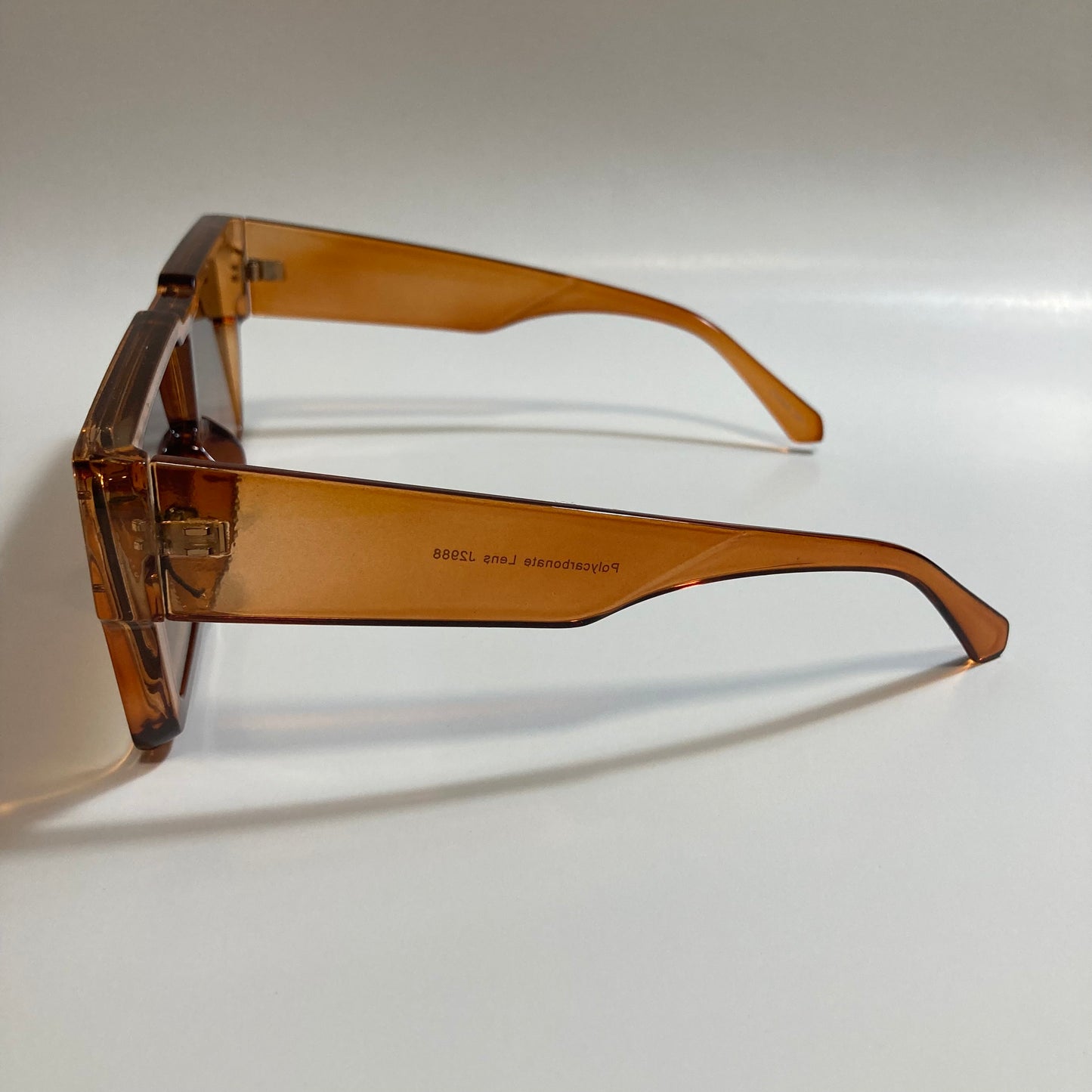 mens and womens brown oversize square sunglasses