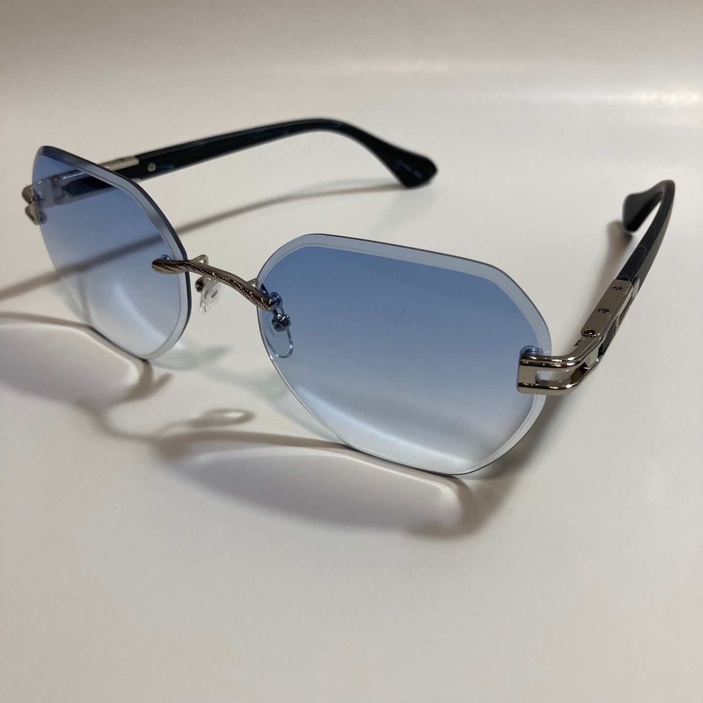 blue and silver rimless sunglasses
