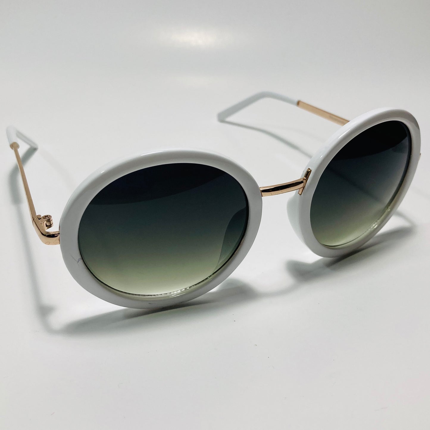 womens white and green round sunglasses