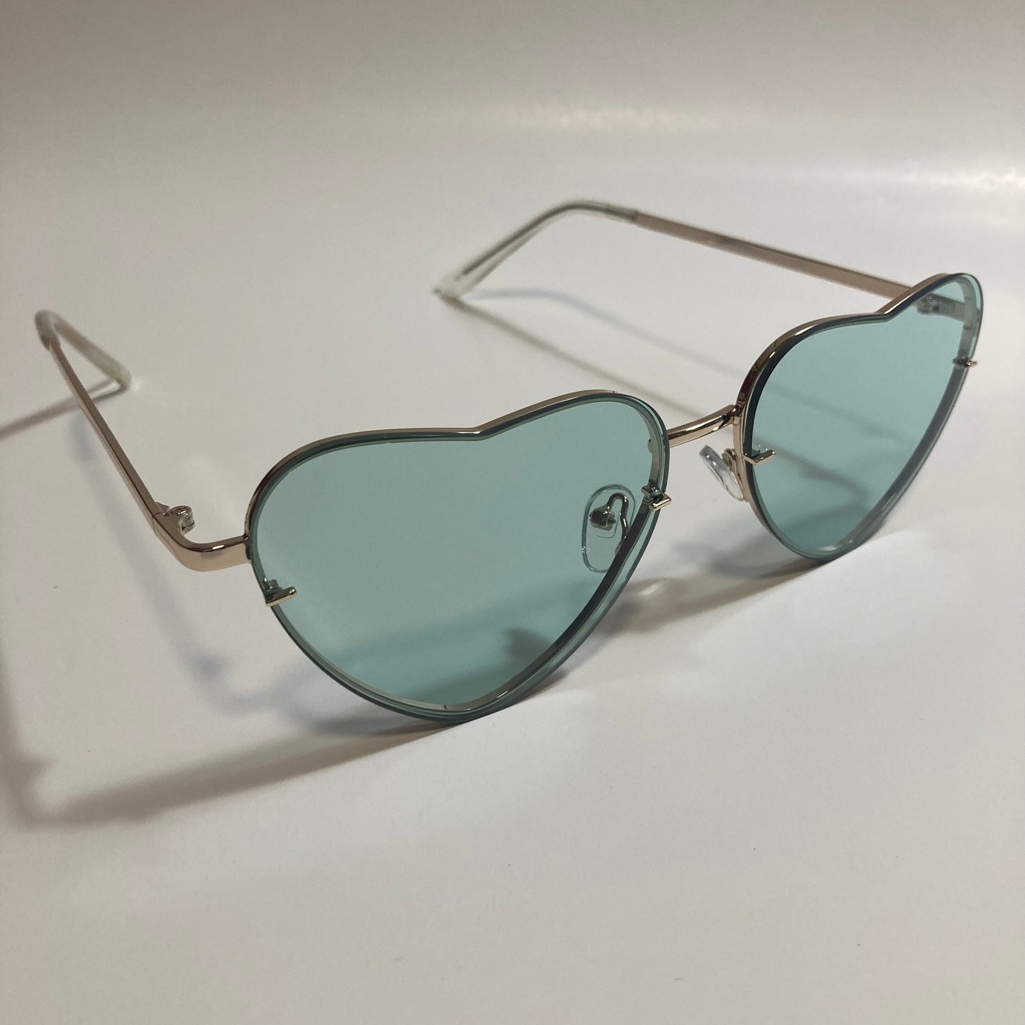 green and gold heart shape sunglasses