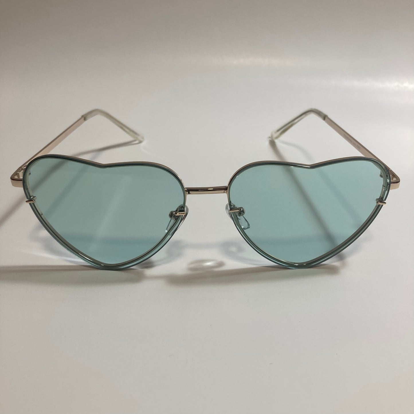 green and gold heart shape sunglasses