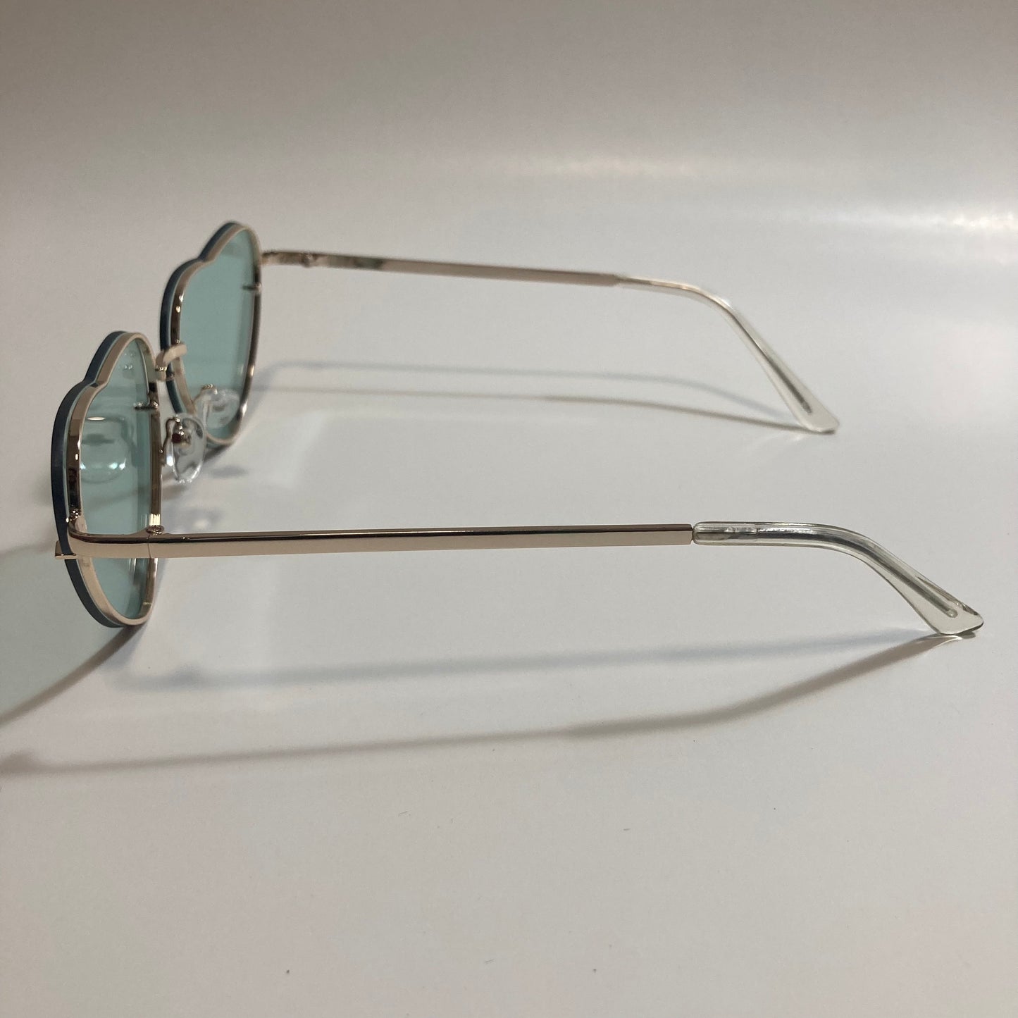 green and gold heart shape sunglasses
