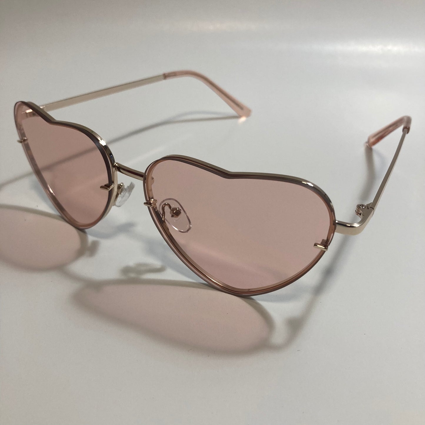 pink and gold heart shape sunglasses